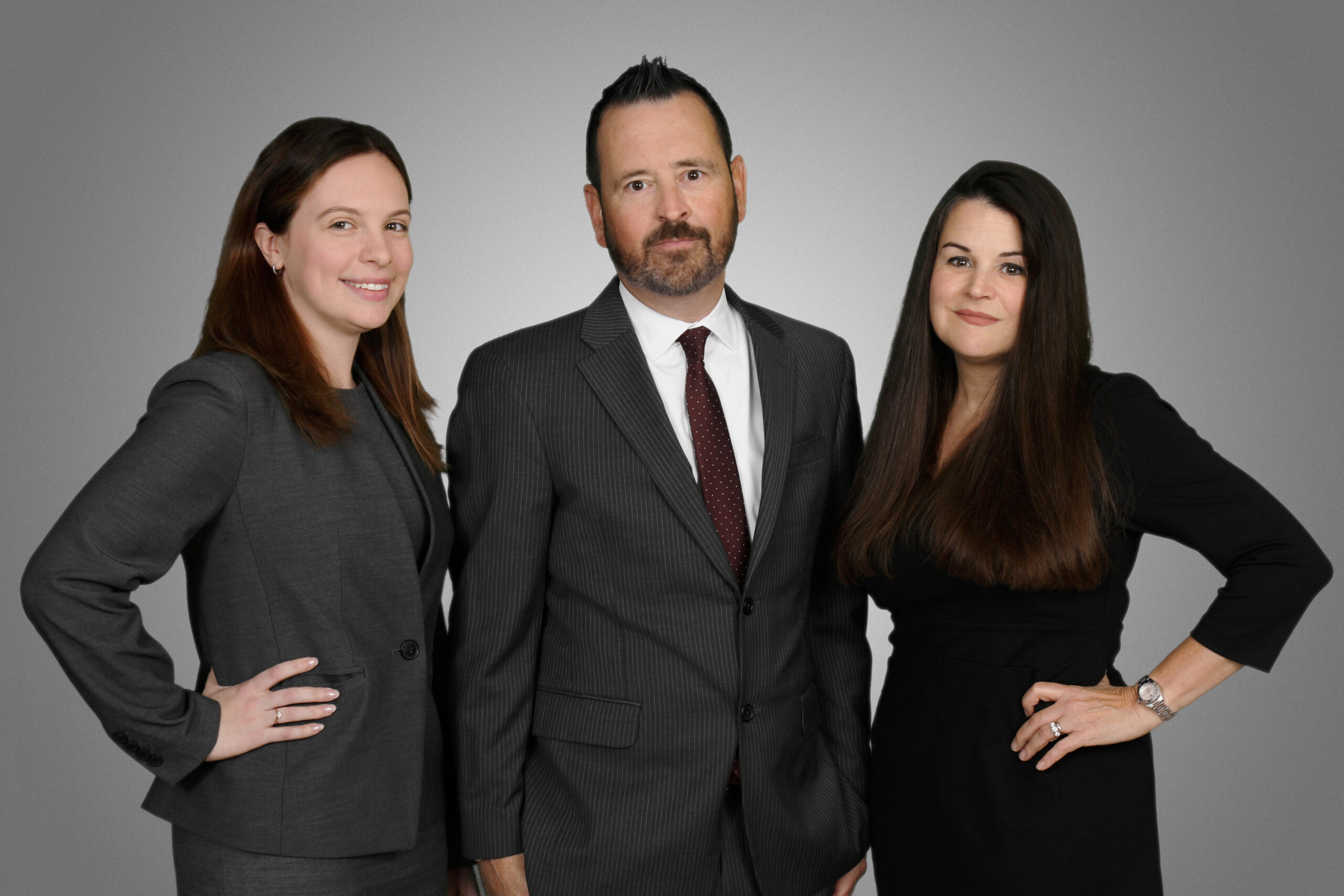 Family Law attorneys. From left to right: Attorney Nicole Marzzacco, Thomas Clark, and Marisa McClellan